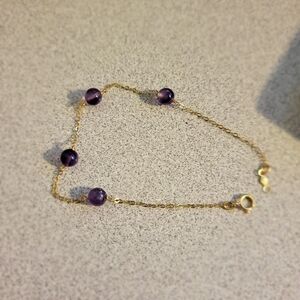 7 1/4" 14k yellow gold and amethyst bracelet